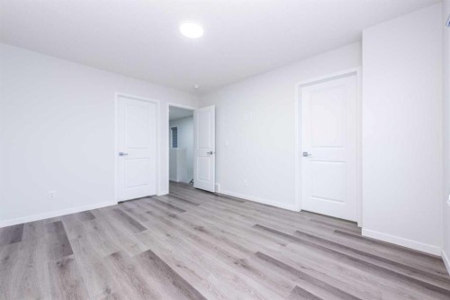57 Corner Glen Row Ne, Calgary, AB - Indoor Photo Showing Other Room