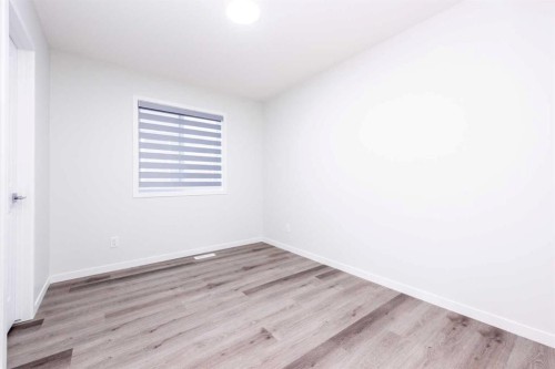 57 Corner Glen Row Ne, Calgary, AB - Indoor Photo Showing Other Room