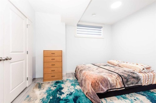 57 Corner Glen Row Ne, Calgary, AB - Indoor Photo Showing Bedroom