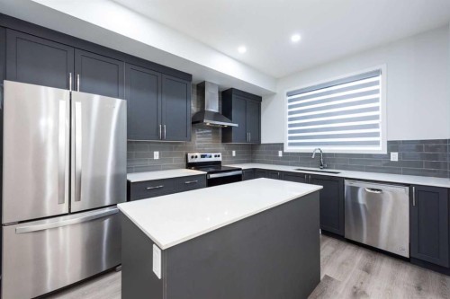 57 Corner Glen Row Ne, Calgary, AB - Indoor Photo Showing Kitchen With Upgraded Kitchen