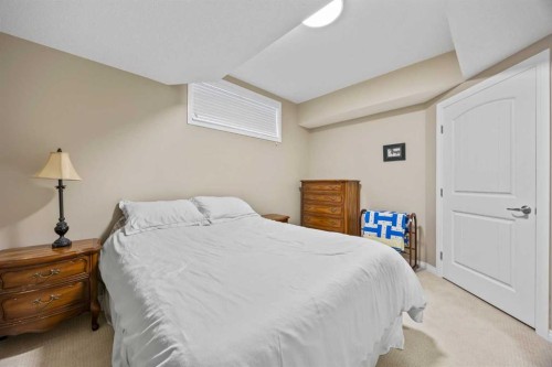 184 Cougar Ridge Manor Sw, Calgary, AB - Indoor Photo Showing Bedroom