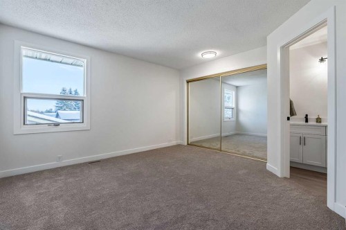 15 Woodford Crescent Sw, Calgary, AB - Indoor Photo Showing Other Room