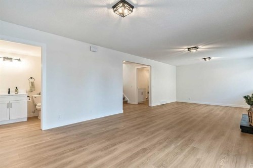 15 Woodford Crescent Sw, Calgary, AB - Indoor Photo Showing Other Room