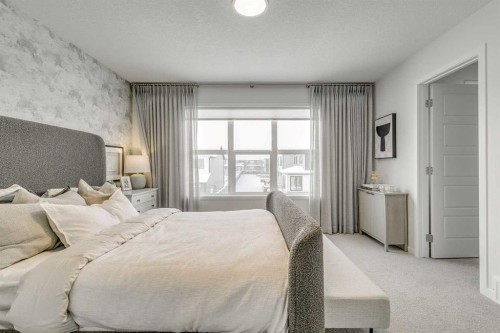 80 Lucas Common Nw, Calgary, AB - Indoor Photo Showing Bedroom