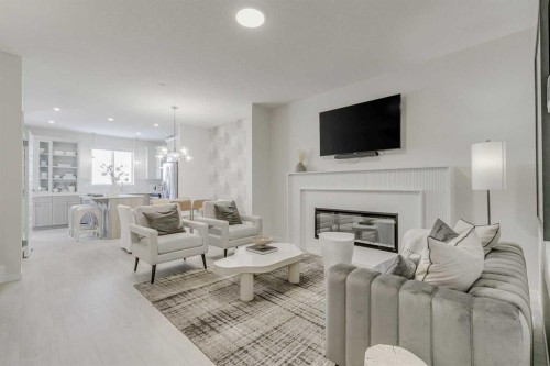 80 Lucas Common Nw, Calgary, AB - Indoor Photo Showing Living Room With Fireplace