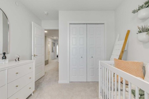 80 Lucas Common Nw, Calgary, AB - Indoor Photo Showing Bedroom