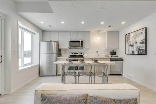 80 Lucas Common Nw, Calgary, AB - Indoor Photo Showing Kitchen With Double Sink
