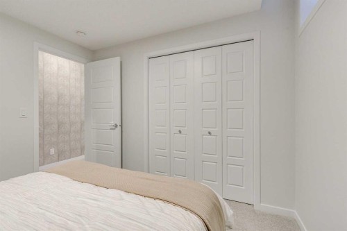 80 Lucas Common Nw, Calgary, AB - Indoor Photo Showing Bedroom