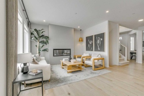 227 Lucas Common Nw, Calgary, AB - Indoor Photo Showing Other Room With Fireplace