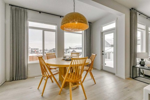 227 Lucas Common Nw, Calgary, AB - Indoor Photo Showing Dining Room