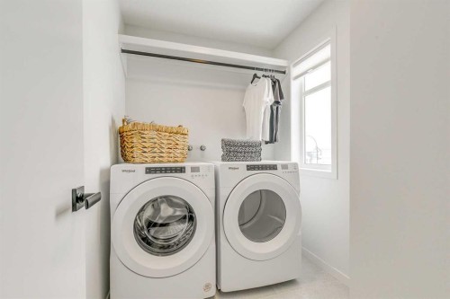 227 Lucas Common Nw, Calgary, AB - Indoor Photo Showing Laundry Room