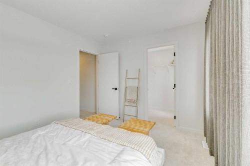 227 Lucas Common Nw, Calgary, AB - Indoor Photo Showing Bedroom