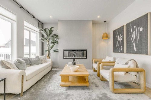 227 Lucas Common Nw, Calgary, AB - Indoor Photo Showing Living Room With Fireplace