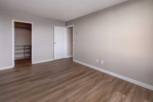 1501-145 Point Drive Nw, Calgary, AB - Indoor Photo Showing Other Room