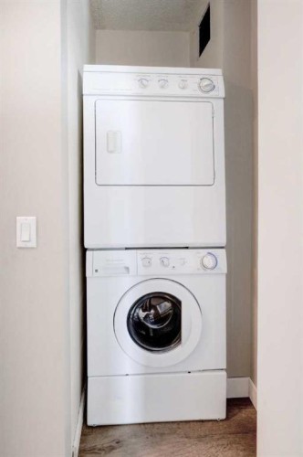 1501-145 Point Drive Nw, Calgary, AB - Indoor Photo Showing Laundry Room