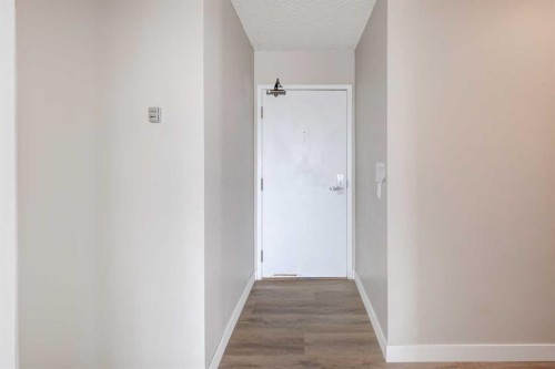 1501-145 Point Drive Nw, Calgary, AB - Indoor Photo Showing Other Room