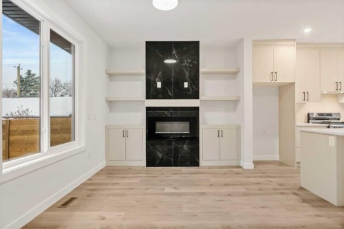 2354 7 Street Nw, Calgary, AB - Indoor Photo Showing Other Room With Fireplace