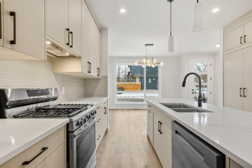 2354 7 Street Nw, Calgary, AB - Indoor Photo Showing Kitchen With Stainless Steel Kitchen With Double Sink With Upgraded Kitchen