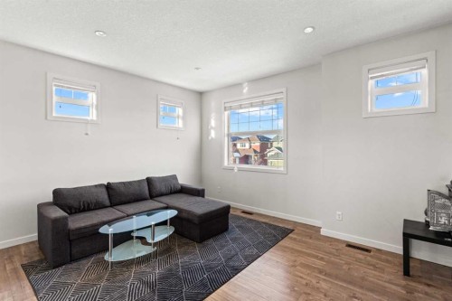901-115 Sagewood Drive Sw, Airdrie, AB - Indoor Photo Showing Living Room