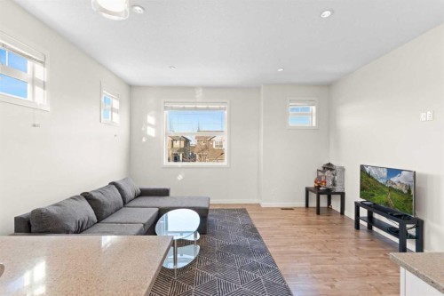901-115 Sagewood Drive Sw, Airdrie, AB - Indoor Photo Showing Living Room