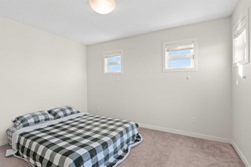 901-115 Sagewood Drive Sw, Airdrie, AB - Indoor Photo Showing Bedroom
