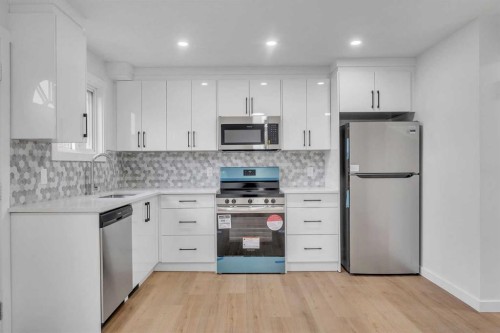 63 Penworth Close Se, Calgary, AB - Indoor Photo Showing Kitchen