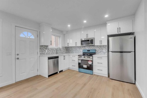 63 Penworth Close Se, Calgary, AB - Indoor Photo Showing Kitchen With Stainless Steel Kitchen With Upgraded Kitchen