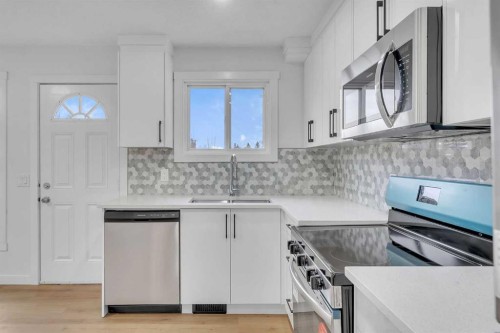 63 Penworth Close Se, Calgary, AB - Indoor Photo Showing Kitchen With Stainless Steel Kitchen