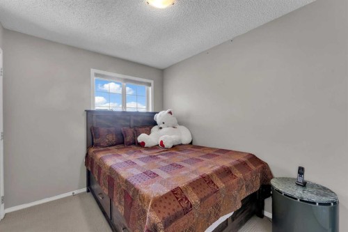 138 Saddlecrest Park Ne, Calgary, AB - Indoor Photo Showing Bedroom