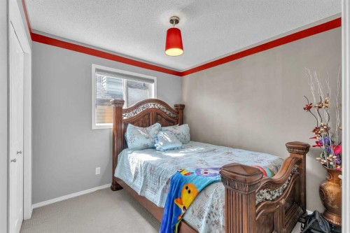138 Saddlecrest Park Ne, Calgary, AB - Indoor Photo Showing Bedroom