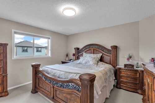 138 Saddlecrest Park Ne, Calgary, AB - Indoor Photo Showing Bedroom