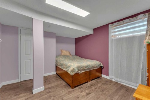 138 Saddlecrest Park Ne, Calgary, AB - Indoor Photo Showing Bedroom