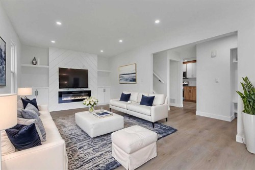 4311 7A Avenue Se, Calgary, AB - Indoor Photo Showing Living Room With Fireplace