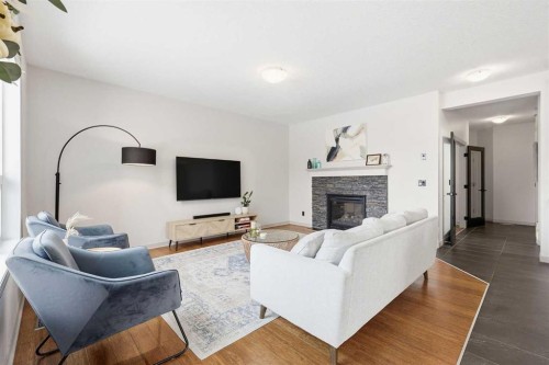 9 Sage Hill Landing Nw, Calgary, AB - Indoor Photo Showing Living Room With Fireplace