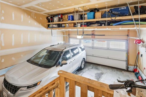 9 Sage Hill Landing Nw, Calgary, AB - Indoor Photo Showing Garage