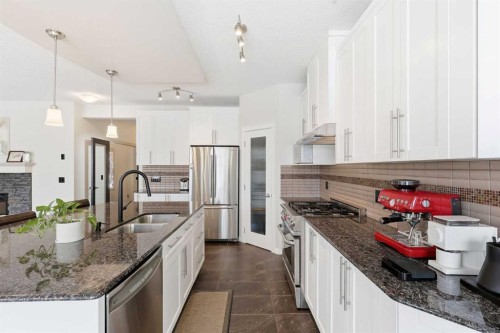9 Sage Hill Landing Nw, Calgary, AB - Indoor Photo Showing Kitchen With Double Sink With Upgraded Kitchen