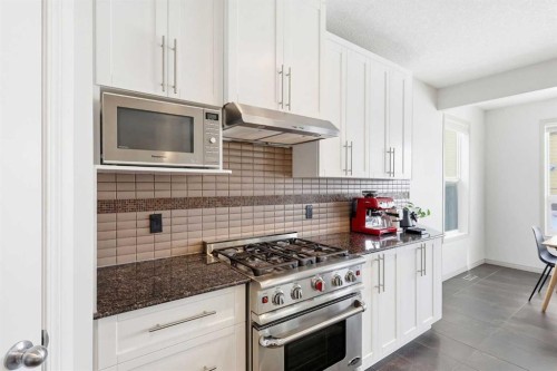 9 Sage Hill Landing Nw, Calgary, AB - Indoor Photo Showing Kitchen With Upgraded Kitchen