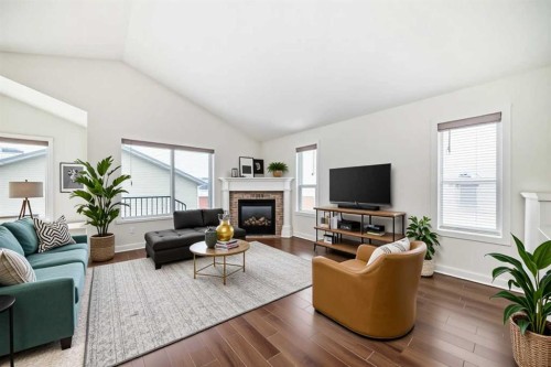226 Saddlebrook Circle Ne, Calgary, AB - Indoor Photo Showing Living Room With Fireplace