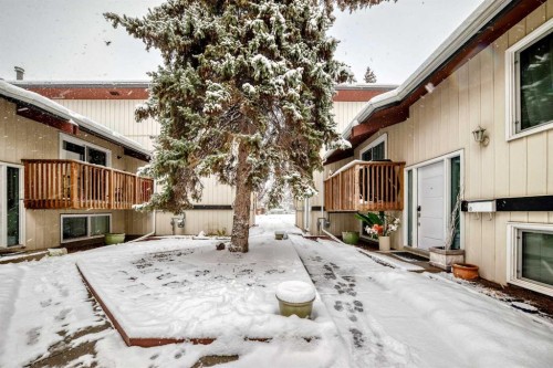 7-2019 2 Avenue Nw, Calgary, AB - Outdoor With Deck Patio Veranda With Exterior