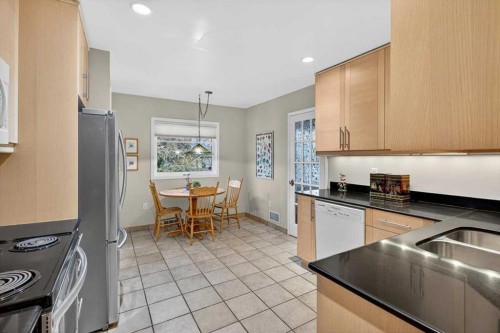 2808 35 Street Sw, Calgary, AB - Indoor Photo Showing Kitchen With Double Sink