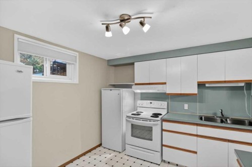2808 35 Street Sw, Calgary, AB - Indoor Photo Showing Kitchen With Double Sink