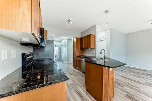 415 Sunrise Terrace Ne, High River, AB - Indoor Photo Showing Kitchen