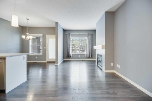384 Copperpond Landing Se, Calgary, AB - Indoor With Fireplace