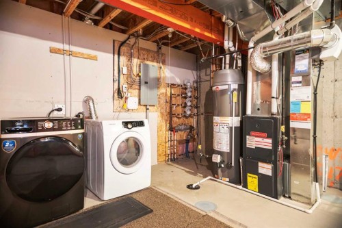 384 Copperpond Landing Se, Calgary, AB - Indoor Photo Showing Laundry Room