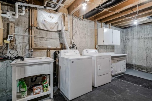 128 Bermuda Drive Nw, Calgary, AB - Indoor Photo Showing Laundry Room