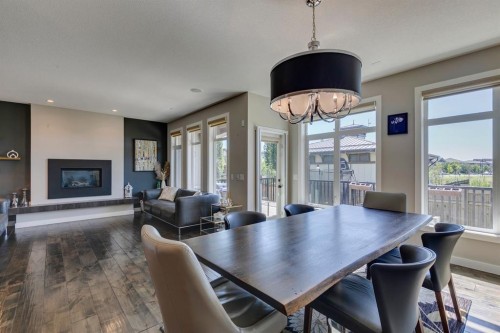 119 Marquis Crescent Se, Calgary, AB - Indoor Photo Showing Other Room With Fireplace