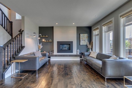 119 Marquis Crescent Se, Calgary, AB - Indoor Photo Showing Living Room With Fireplace