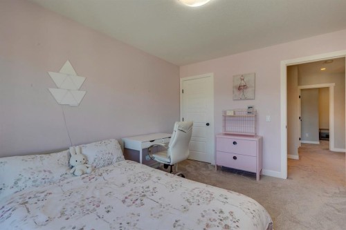 119 Marquis Crescent Se, Calgary, AB - Indoor Photo Showing Bedroom
