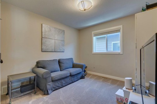 119 Marquis Crescent Se, Calgary, AB - Indoor Photo Showing Living Room