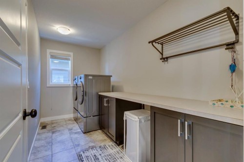 119 Marquis Crescent Se, Calgary, AB - Indoor Photo Showing Laundry Room